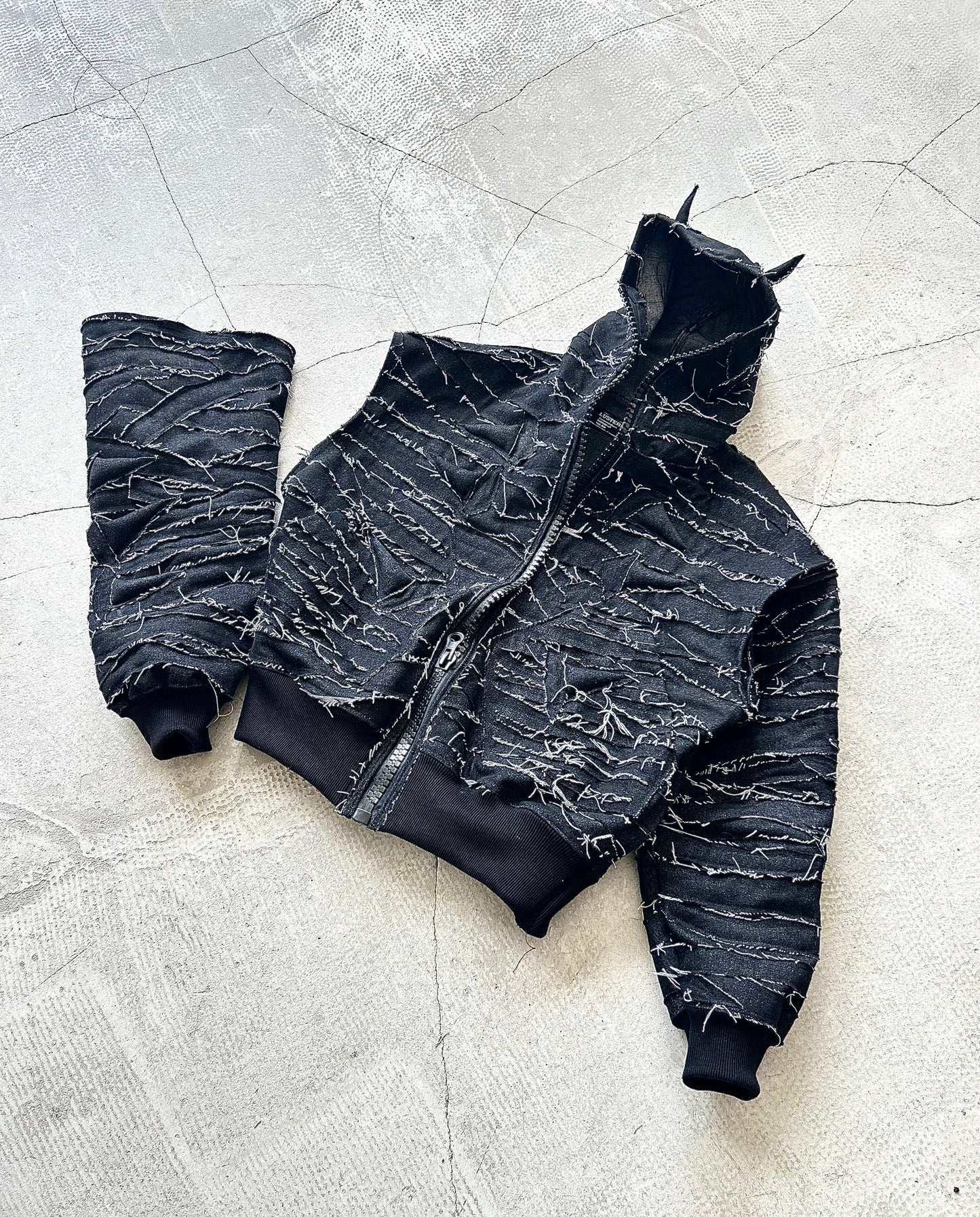 000/ DISTORTED SHELL JACKET