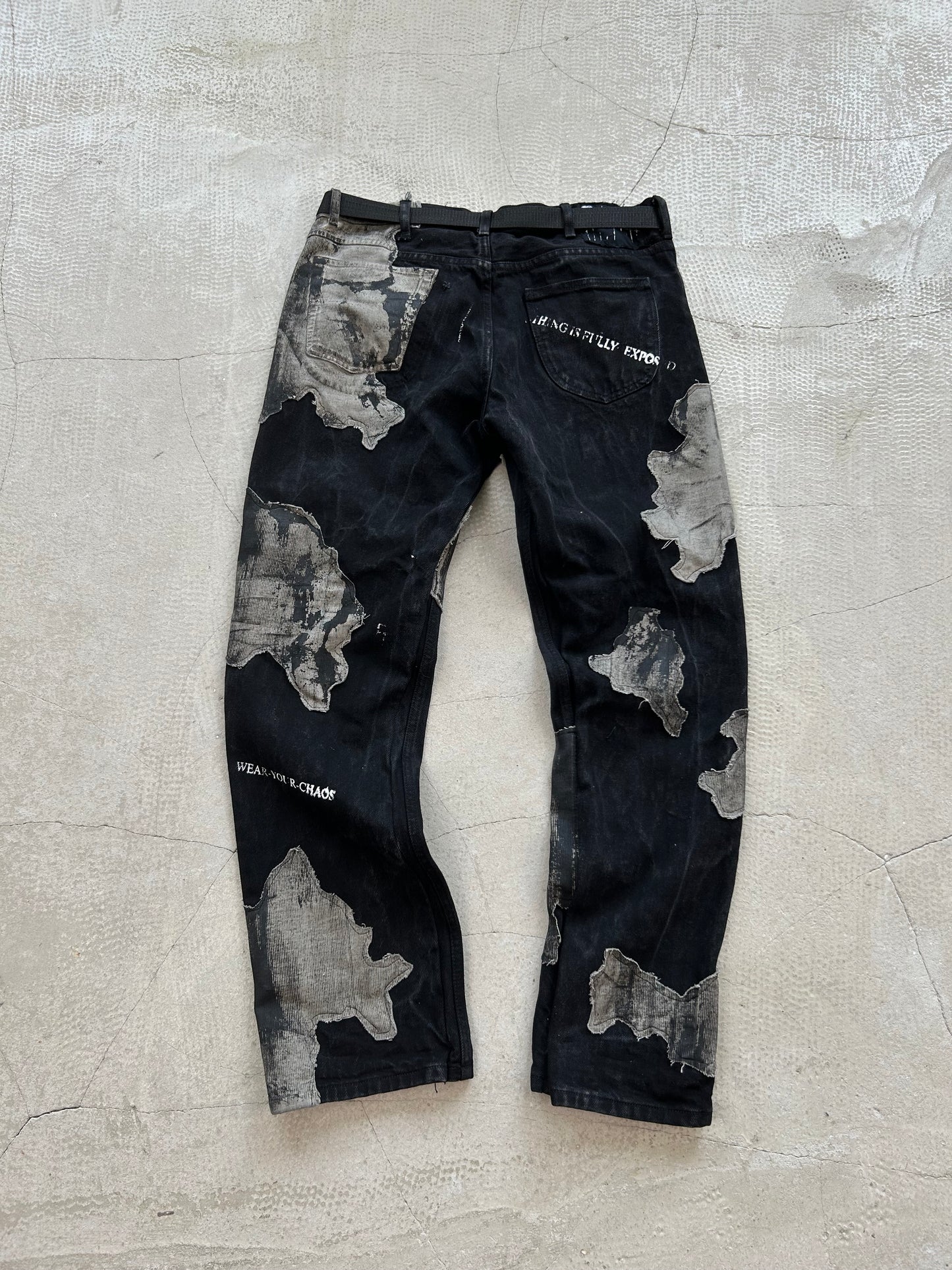 000/ SUBHUMAN ARTIFACT TROUSERS