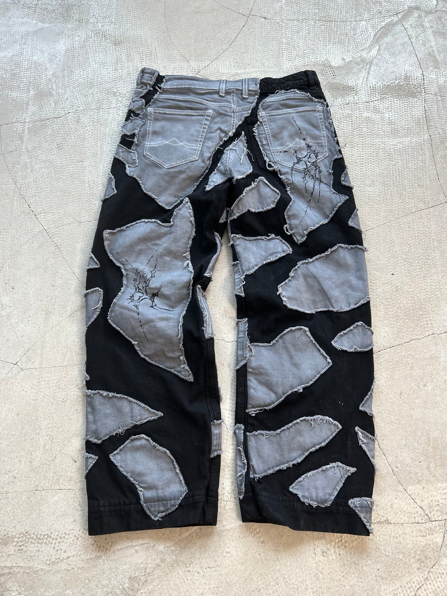 00/DECONSTRUCTED DENIM BAGGY PANTS