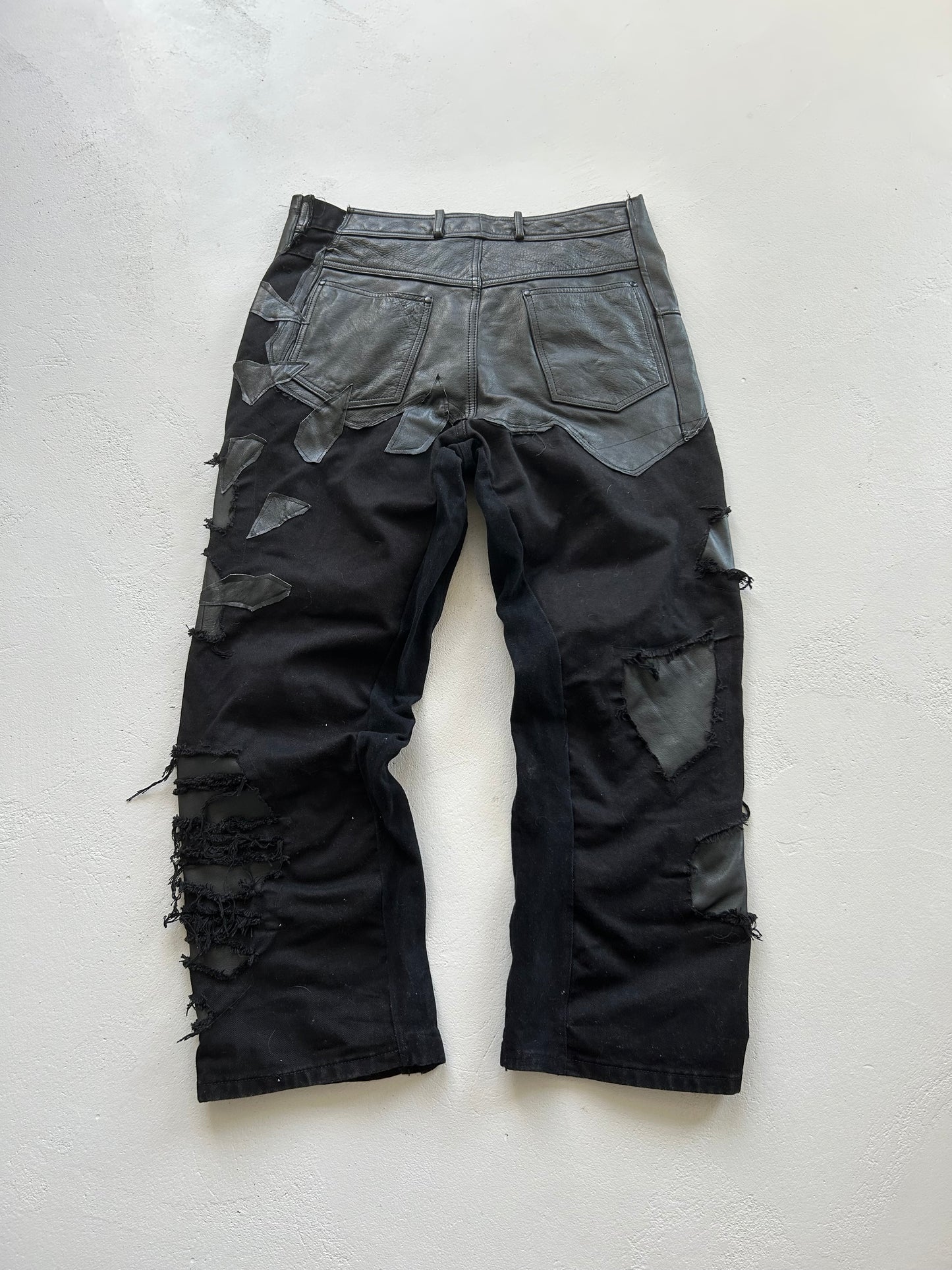0/LEATHER DENIM PANTS